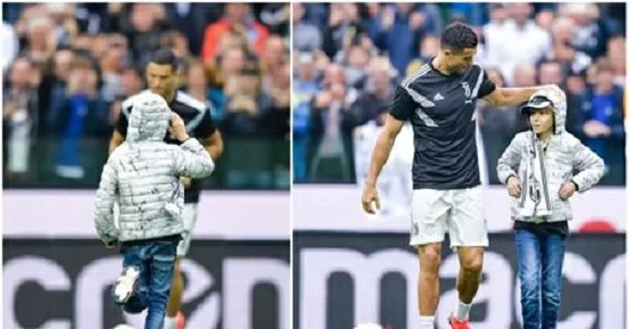 FOTO – Invasione di un bambino, CR7 gli fa l’autografo
