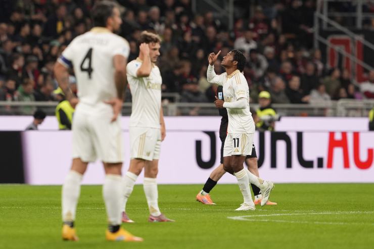 Juan Cuadrado segna ed esulta dopo la rete dell'1-1 a San Siro contro il Milan