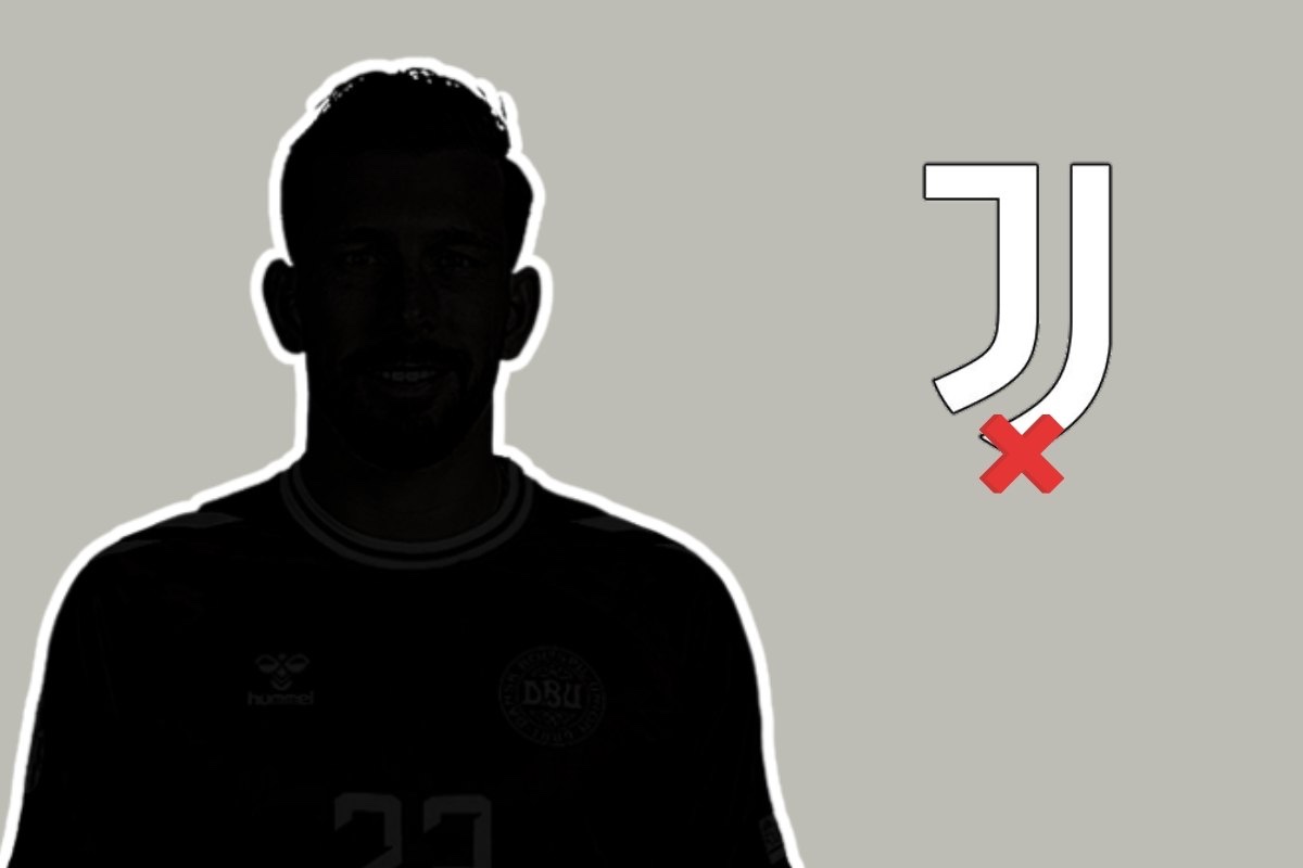 Giocatore misterizzato e logo della Juventus