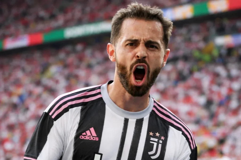 Bernardo Silva esulta con la maglia della Juventus durante una partita allo stadio