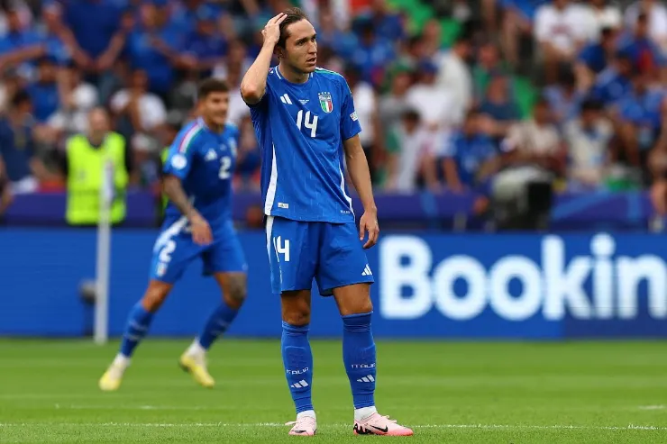 Federico Chiesa in maglia azzurra numero 14 durante una partita della nazionale italiana
