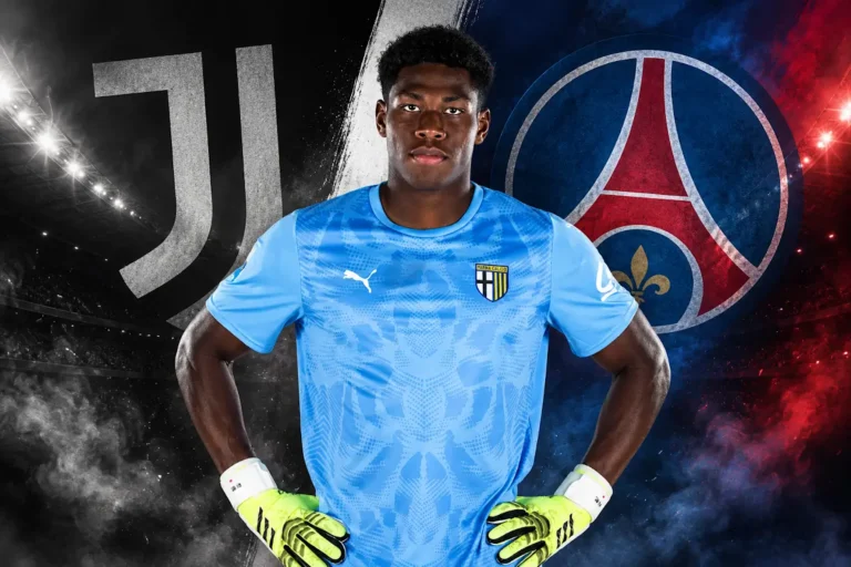 Suzuki portiere in maglia azzurra con guantoni gialli, tra i loghi di Juventus e PSG